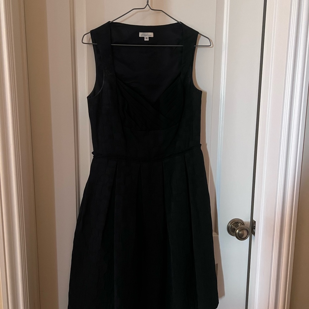 Black cocktail dress by Shashanna, knee length
